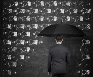 businessman with umbrella and thumb down rain